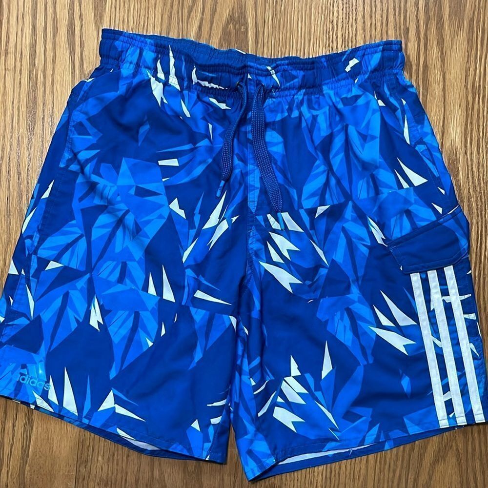 Adidas swimming shorts. Drawstring waist. Size small. Pockets.